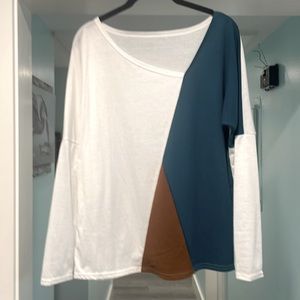 NWOT. Long sleeve woman’s shirt/blouse. Never been worn.